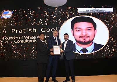 CA Pratish Goel receiving recognition on stage as Founder of WhiteWorth, at a Ministry of MSME-supported award ceremony